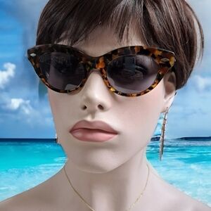 Kenzo sunglasses eyewear featuring cat eye frame tortoiseshell arms & detailling